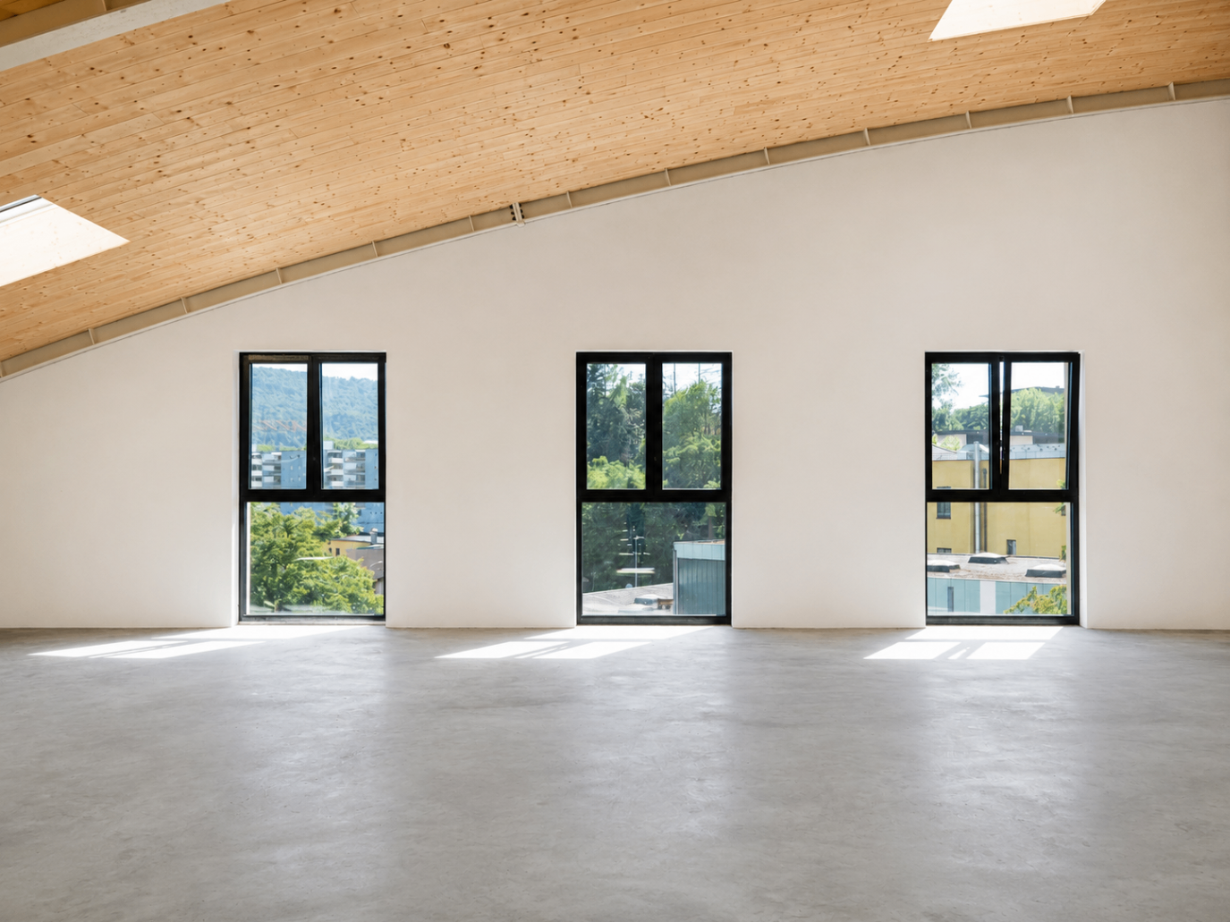 Glazed front of the upper level with curved timber roof